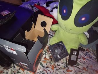 AMD Ryzen 7 1700 with factory new cooling fan/heatsink in an AMD Ryzen 7 2700X box