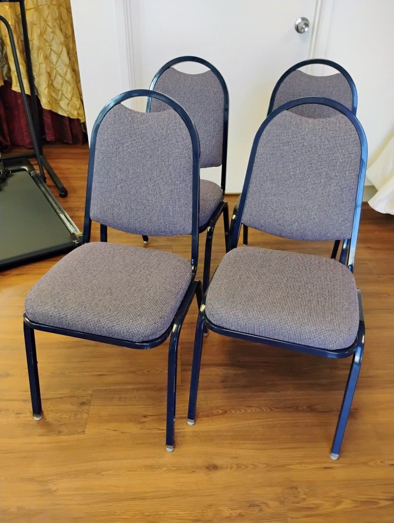4 Cushioned Stacking Chairs