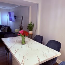 White Faux Marble Dining Table