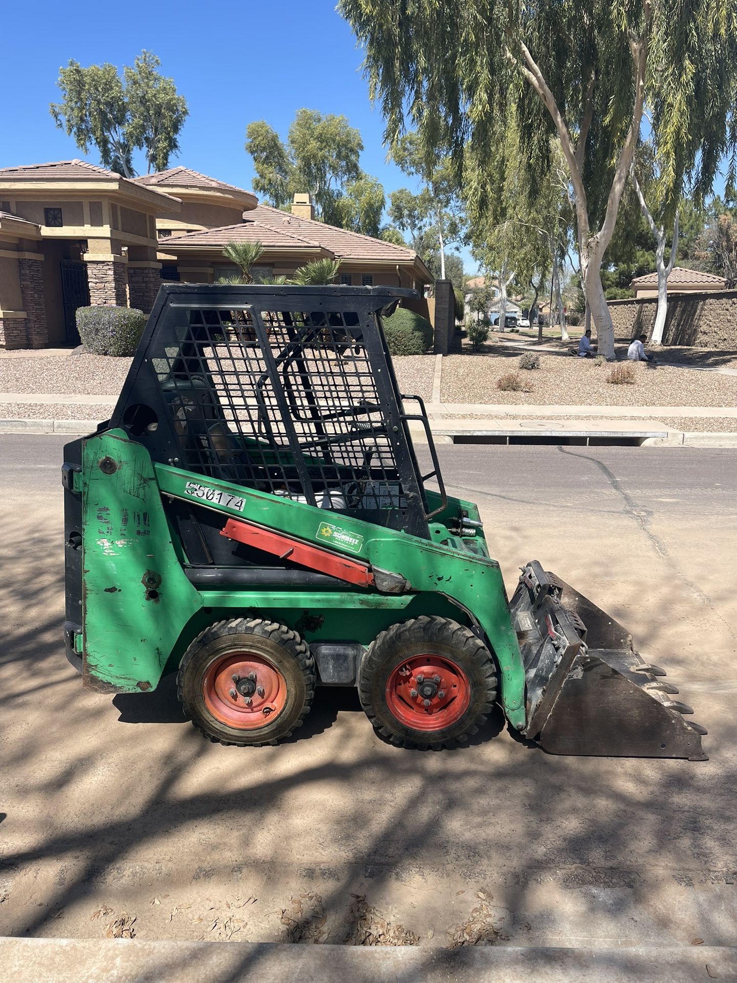 Bobcat with Dump Trailer and Extras