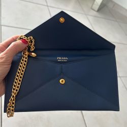 prada envelope clutch with chain strap