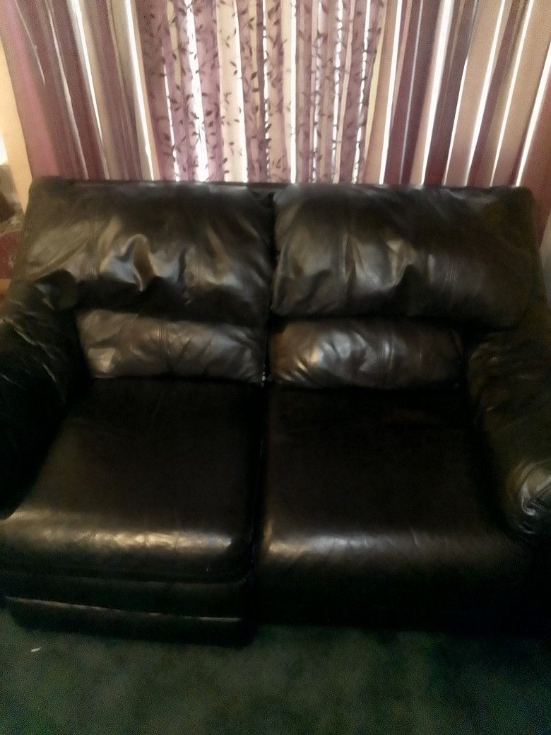 Black Leather Reclining Loveseat