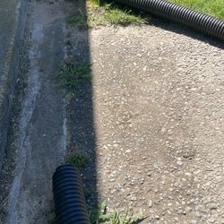 Approximately 25 Feet Of 4 Inch Black Plastic Drain Pipe New Never Been Used 