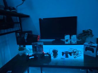 Nintendo Switch with lots of extras $180 (over $400 extras, 2 wireless controllers, extra joy con, accessories and cases)