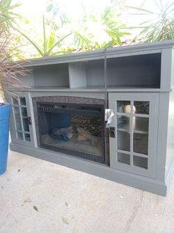 Entertainment center with fireplace