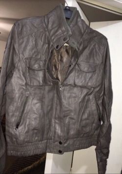 Ladies leather jacket in excellent condition no pets or dogs smoke free home size LARGE!!!