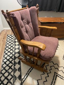 Solid rocking chair with cushion