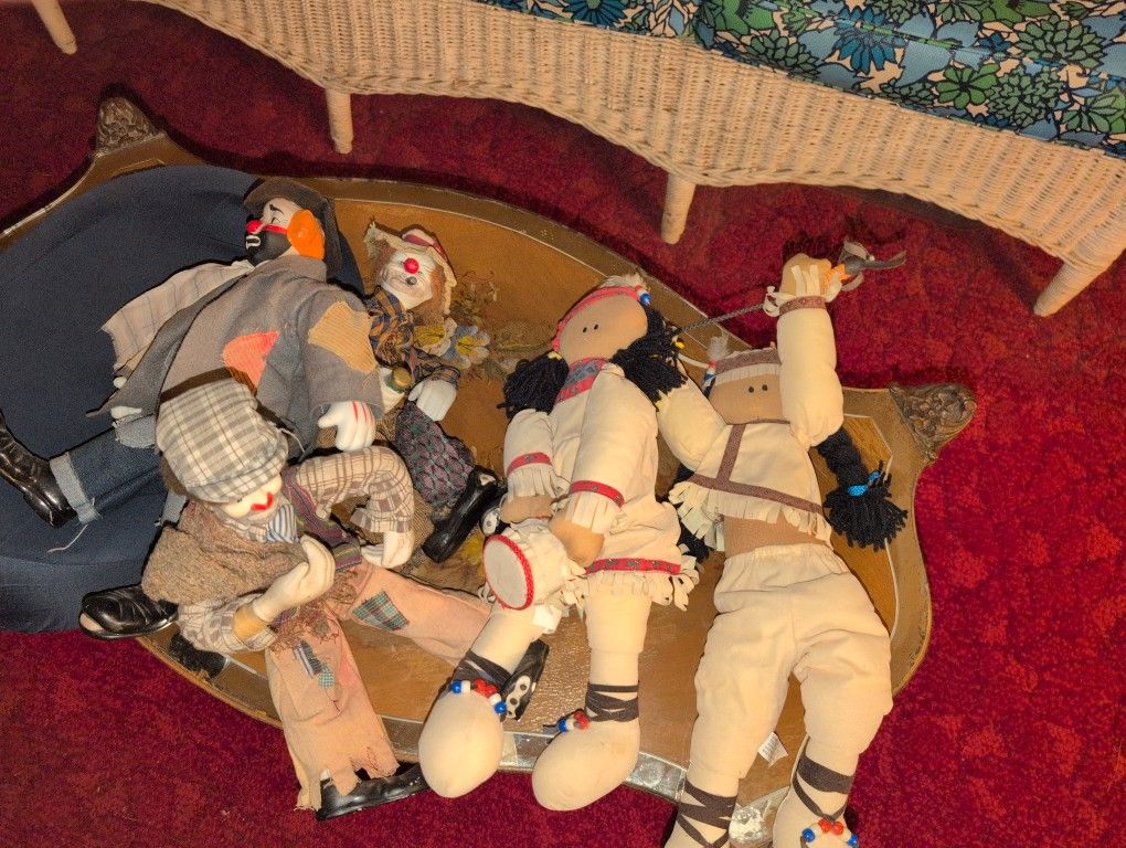 Clowns And Indian Dolls