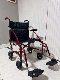 Transport wheelchair,