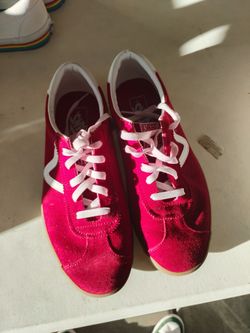 Dark red pants off the wall