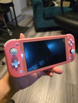 Nintendo switch lite pink
