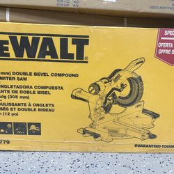 All new Dewalt DSW779 Sliding milter Saw