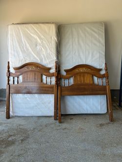 Two twin headboards with metal frames