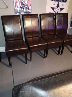 6 Brown leather chairs