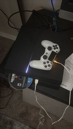 PS4 with controller and camera