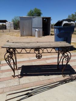 Steel metal table with tipi sticks and one rod