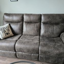 Ashley Leather Couch With Recline Ends. 