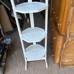 A mid century pie/muffin stand 42 inches tall 