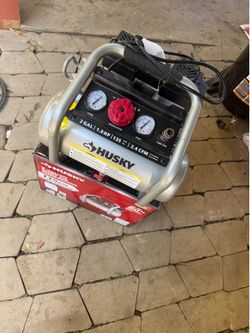 Husky 2 Gal. 135 PSI Portable Electric Oil-Free Quiet Jobsite Air Compressor with Dual Pressure Gauges and 1-Quick Coupler
