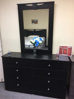 Black dresser with mirror