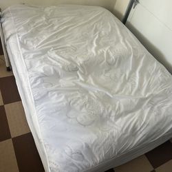 Bed And Wood Bedframe