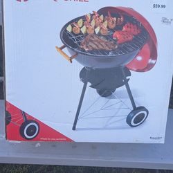 Asador nuevo. $25.00