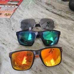 3 Sets Of Oakley Sunglasses 