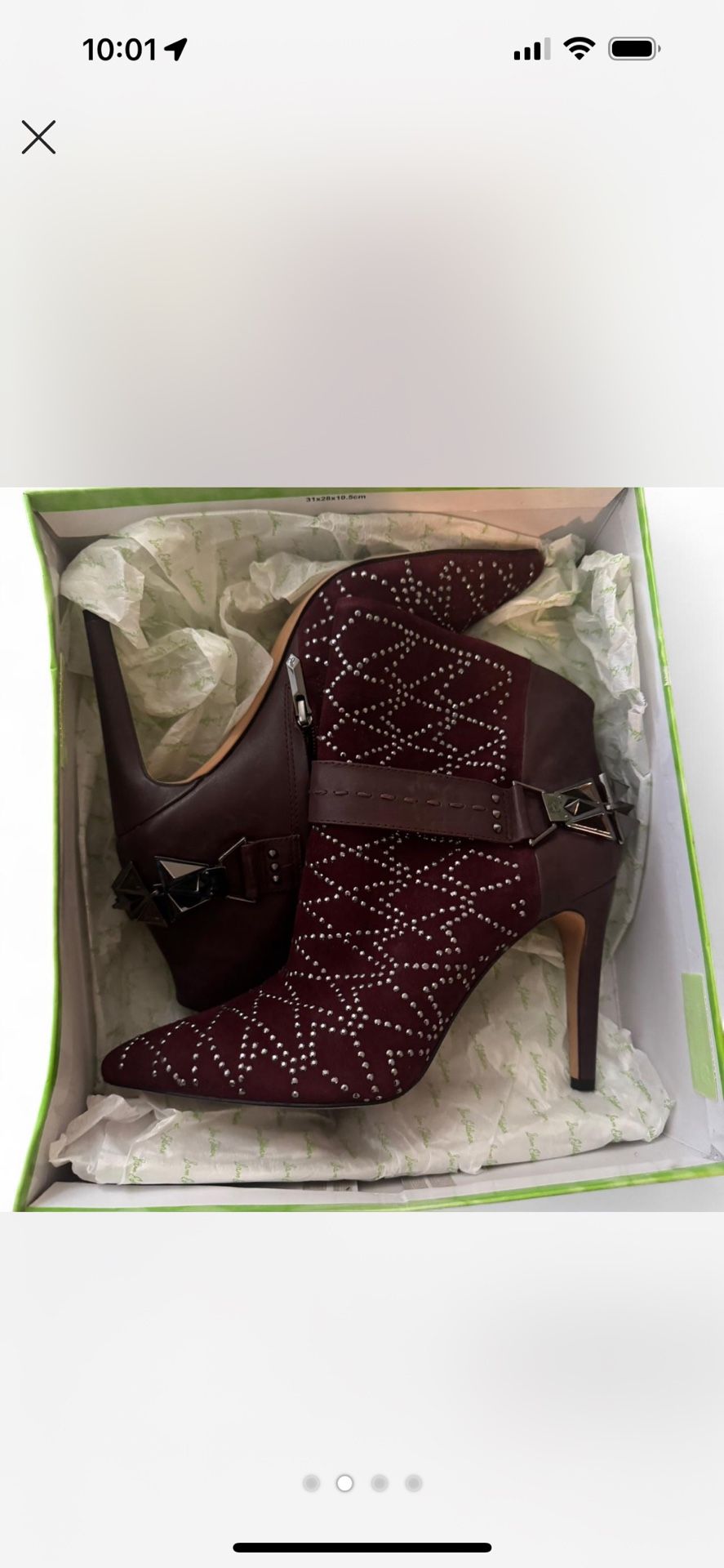 Burgundy suede embellished ankle heeled boots with pointed toe.