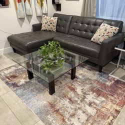 Charcoal Grey Real Leather sectional .