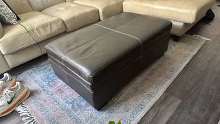 Padded leather ottoman