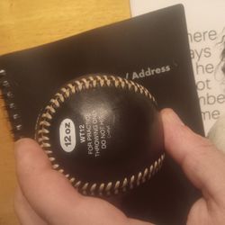 12 Oz Weighted Baseball And Then Two Regular Baseballs