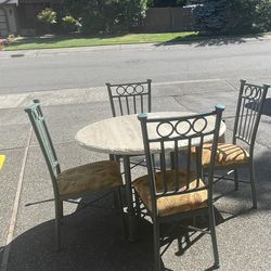 Round 45” Diameter Kitchen Table And 4 Chairs. 