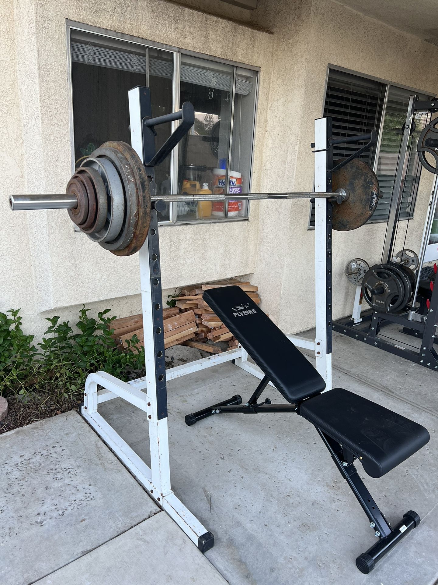 Squat Rack Weight Bench With Bar, Weights, And Bench