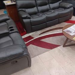Black Friday sale now. Madrid, gray leather reclining sofa and loveseat set only $1299. Easy finance option. Same day delivery.