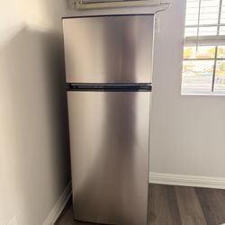 56.5 inch tall  x 21 inc wide fridge 