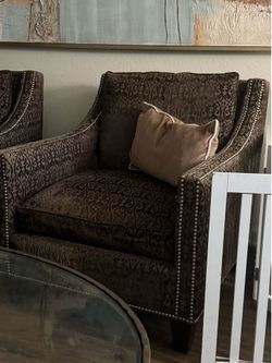 2 brown accent chairs