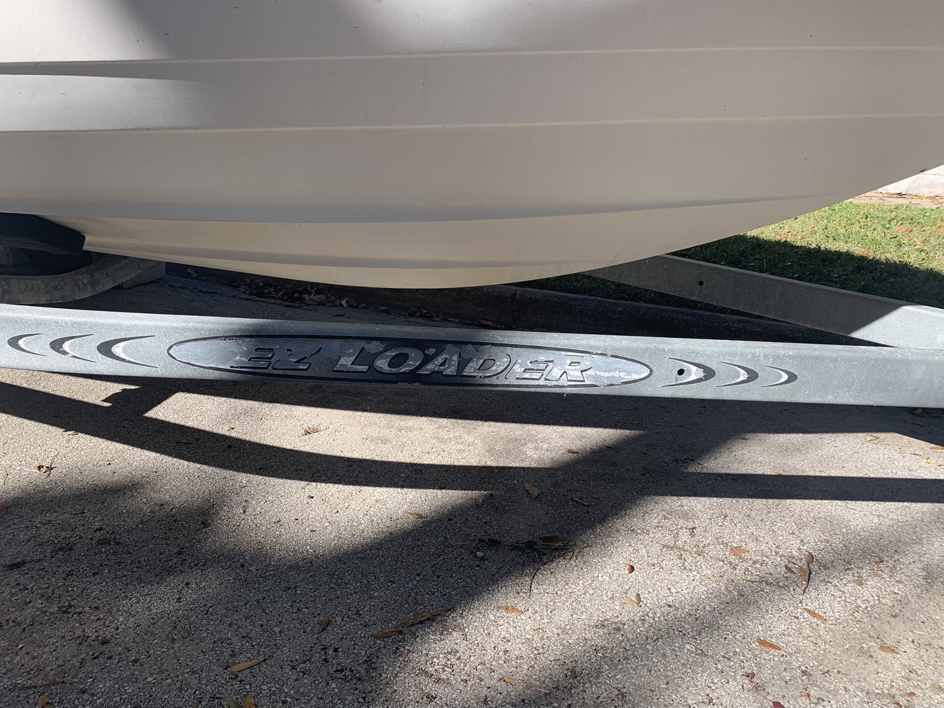 20 foot boat trailer and 17 foot boat that does not run but has the