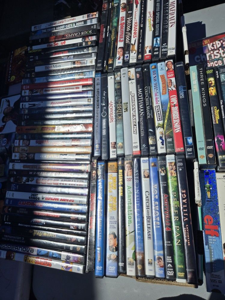 Multiple DVDs And VHS Tapes