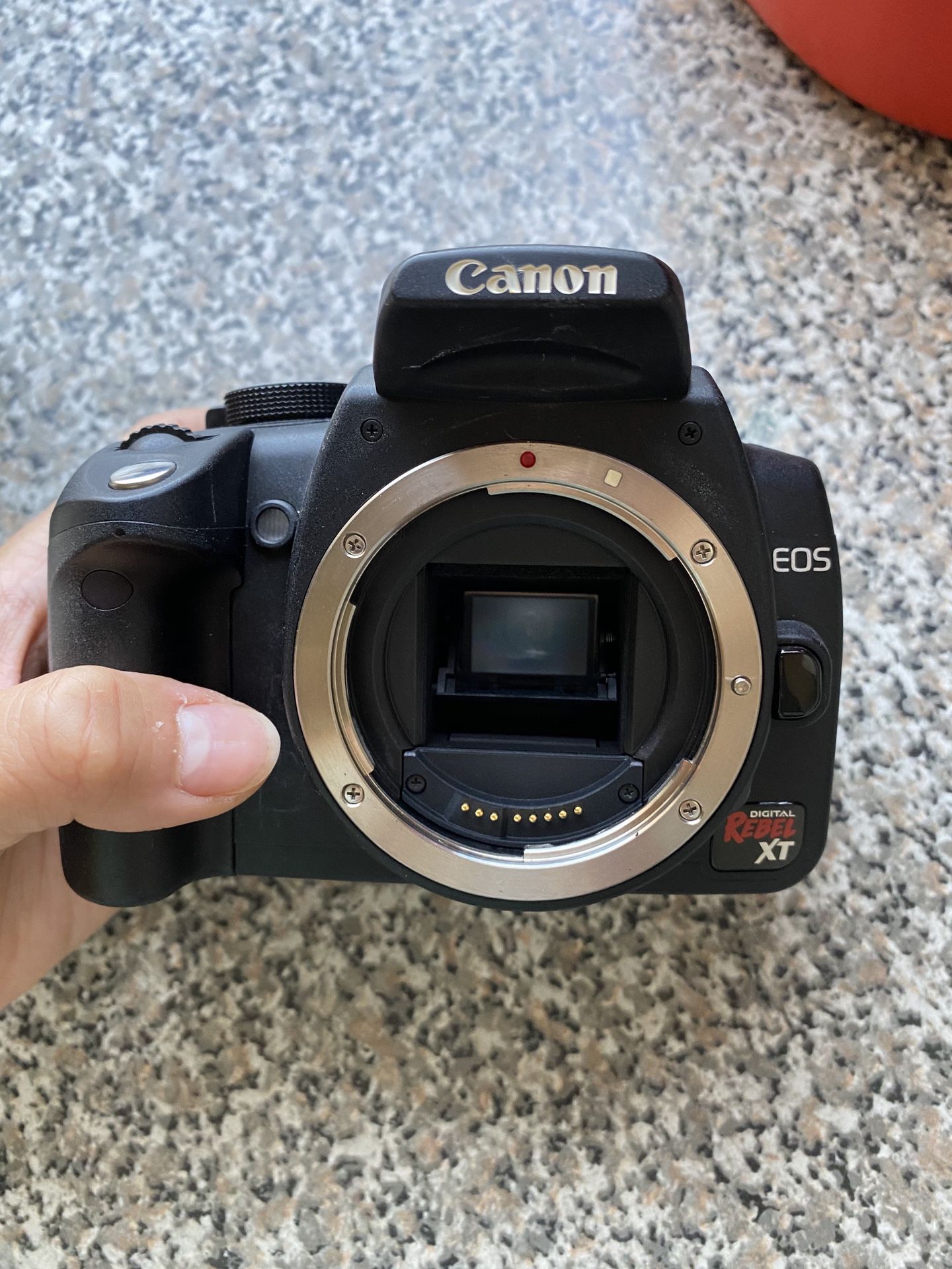 Canon EOS Digital Rebel XT camera with EF-S 18-55 mm 1:3.5-5.6 IS lens