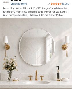 New Name brand Kohros round mirror 32"