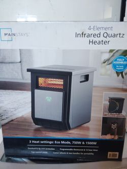 Mainstays heater with remote control  new in closed box