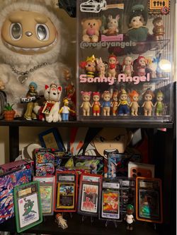 Trinkets and graded Pokemon cards