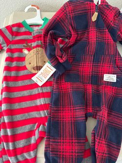 New baby clothes $15 both size 9 months