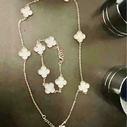 Clover, necklace, and bracelet