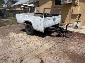 Hydraulic dump bed