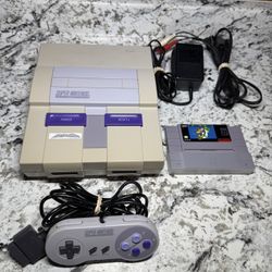 Super Nintendo Entertainment System With Mario World 