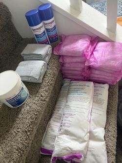 Frida Mom, Dermoplast, and CVS Health Postpartum Recovery Kit