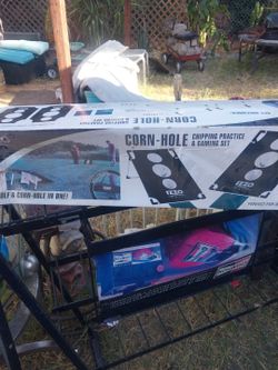 Golf cornhole game
