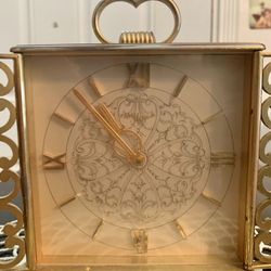 Vintage Imhof Swiss brass clock.