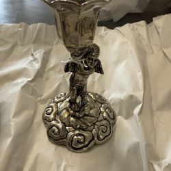 vintage silver-plated candlestick holder featuring a romantic angel motif